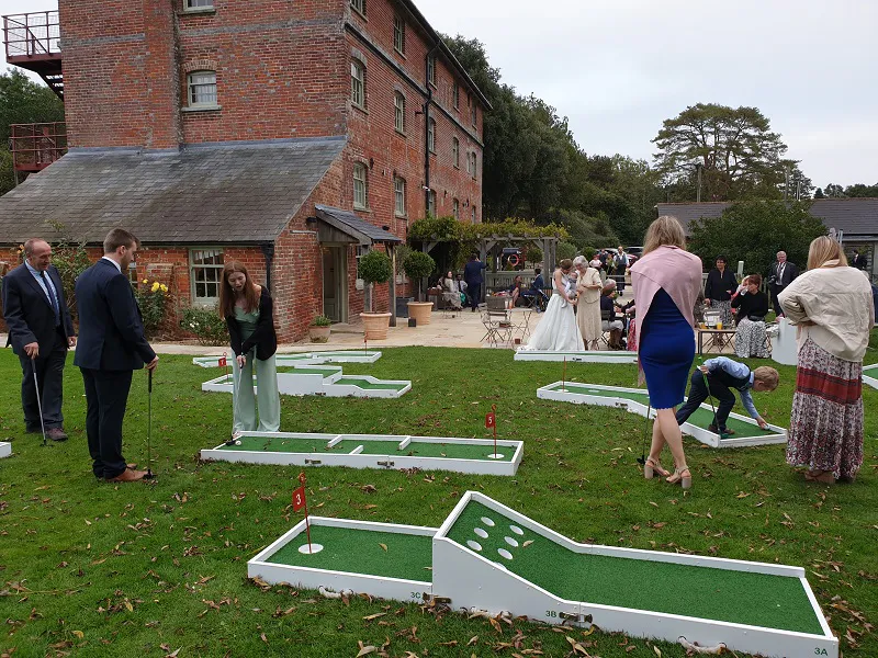 Weddings with mini golf being played during drinks recpetion